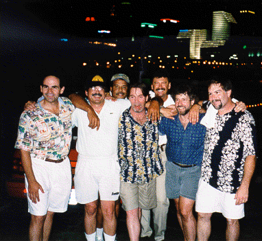 After lugging all the equipment up the hill, John Berg, David Sapadin, Ernie Waits, Bill Katz, Marv Kopman, Stu Klein, and Ken Newman pose in front of the Cincy skyline. We did try to find Walt Smith, but couldn't -- so we had to do all this work ourselves!!!