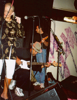 Judy Sigman, Ernie Waits on bass, John Berg on guitar