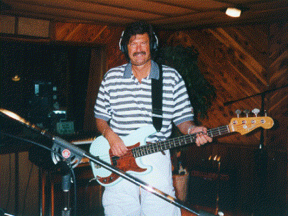 Marv Kopman listens to his track